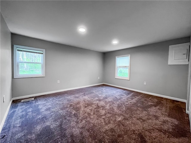 131 W Sullivanville Rd, Veteran, NY 14845 - spare room featuring dark colored carpet, baseboards, and recessed lighting