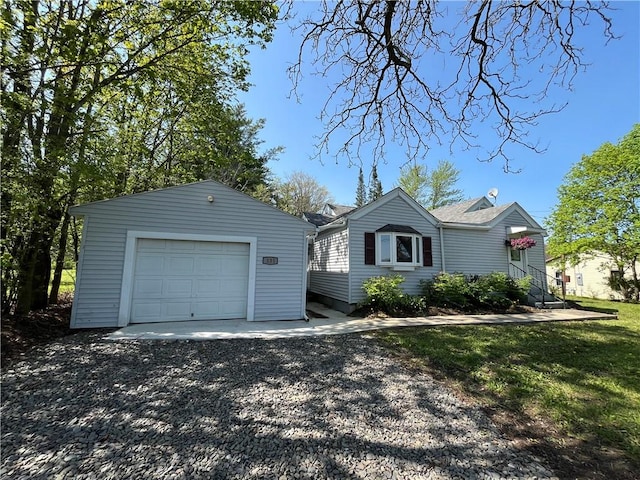 131 W Sullivanville Rd, Veteran, NY 14845 - view of front of house with an outdoor structure, a garage, and driveway