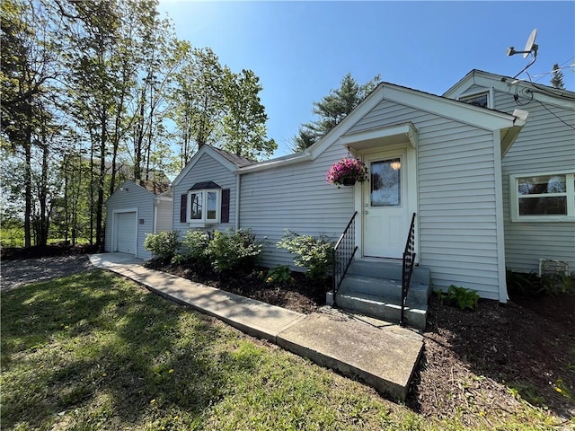 131 W Sullivanville Rd, Veteran, NY 14845 - view of front of house featuring entry steps, an outdoor structure, and a garage