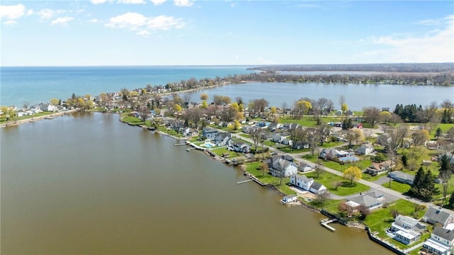 aerial view with a water view and a residential view