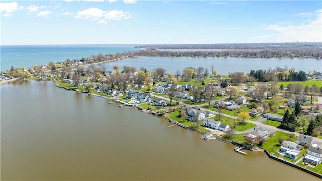 aerial view with a water view and a residential view