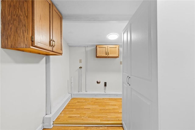hallway featuring light wood-style flooring