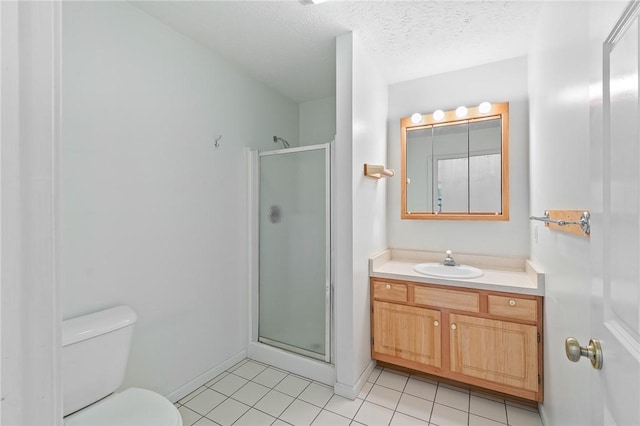 full bath featuring baseboards, toilet, a shower stall, tile patterned floors, and vanity