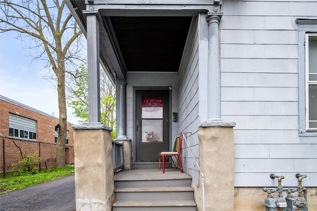 property entrance featuring fence