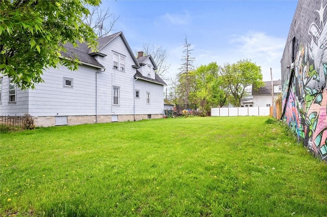 view of yard with fence