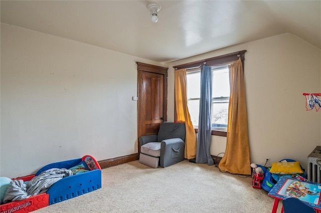 game room with vaulted ceiling and carpet floors