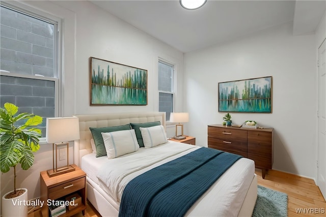 bedroom featuring light wood-type flooring
