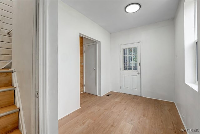 hall featuring light wood-type flooring