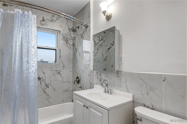 bathroom featuring toilet, vanity, tile walls, and shower / bath combo with shower curtain