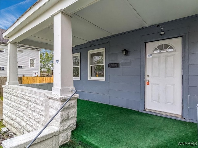 entrance to property with a porch