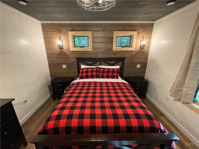 2323 State Route 29, Salisbury, NY 13329 - bedroom with wooden walls, baseboards, and wood finished floors