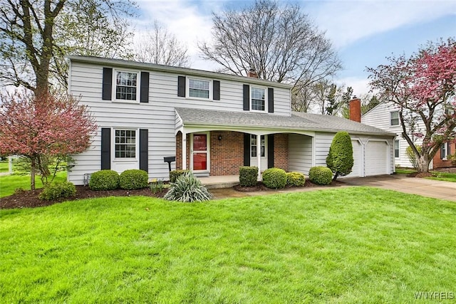 traditional-style home featuring covered porch, a garage, a chimney, concrete driveway, and a front yard