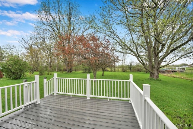 deck featuring a lawn