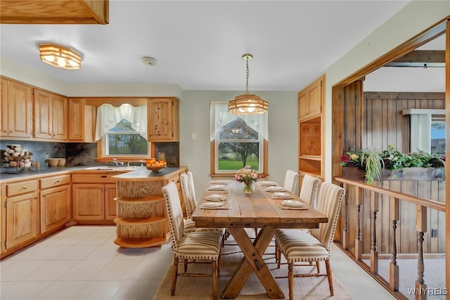 dining area with light tile patterned flooring