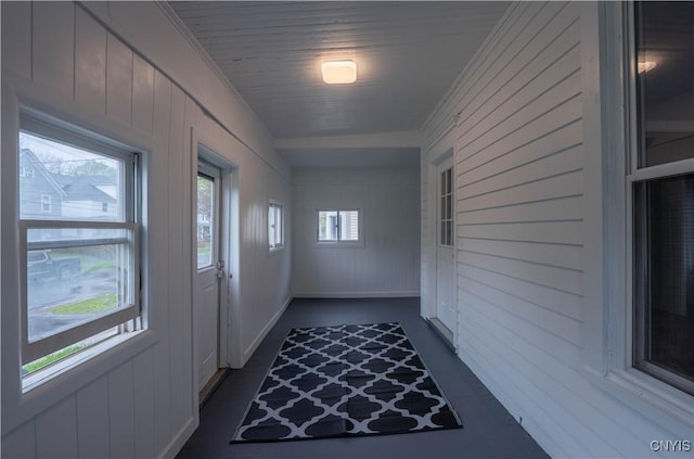 corridor with crown molding