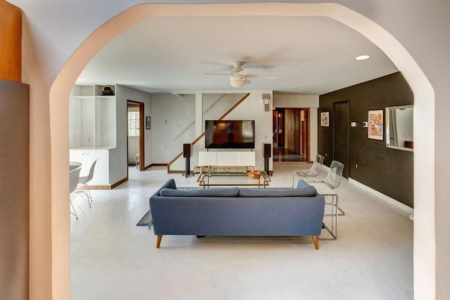 49080 State Highway 30, Roxbury, NY 12474 - living room with arched walkways, finished concrete floors, ceiling fan, baseboards, and recessed lighting