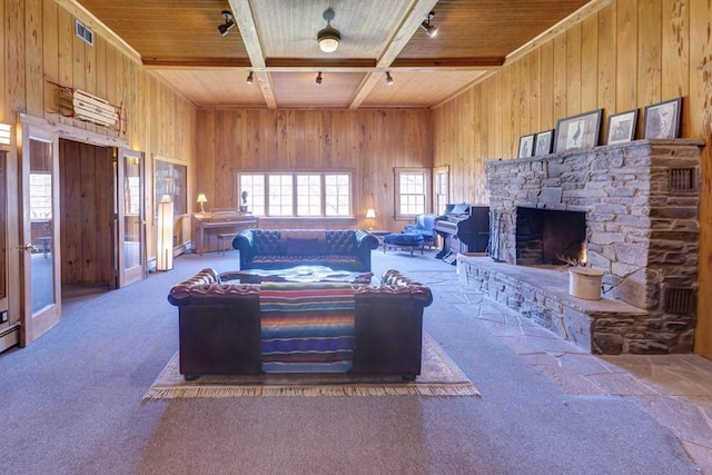 49080 State Highway 30, Roxbury, NY 12474 - living area featuring wood walls, wooden ceiling, beam ceiling, carpet floors, and a fireplace