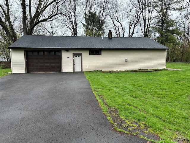 garage with aphalt driveway