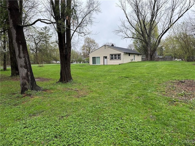 view of yard with a garage