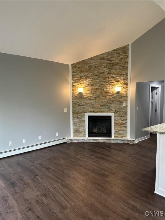 unfurnished living room featuring high vaulted ceiling, a fireplace, baseboards, baseboard heating, and dark wood-style floors