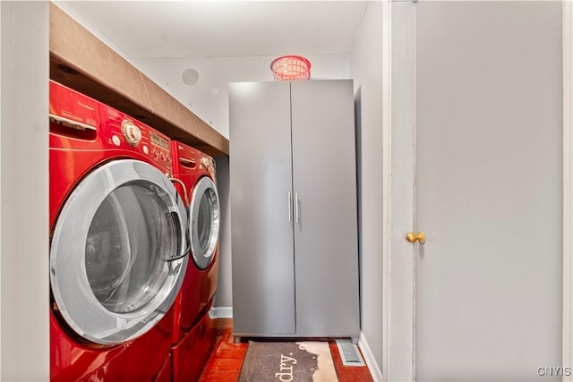 laundry room with washer and dryer