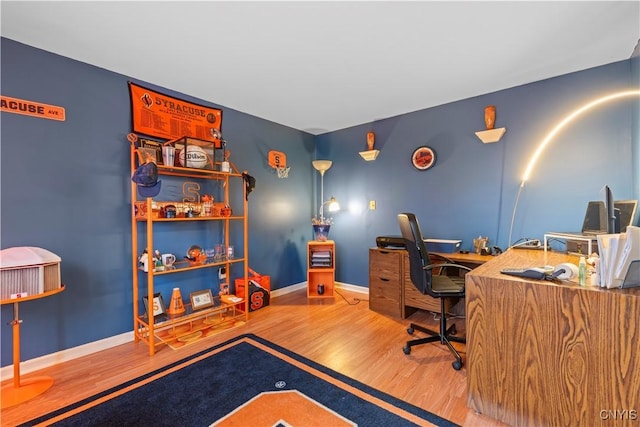 office area featuring wood finished floors and baseboards