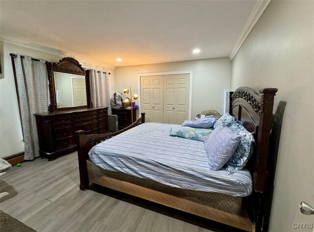 107 Birchwood Ln, Frankfort, NY 13340 - bedroom with crown molding, recessed lighting, a closet, and wood finished floors