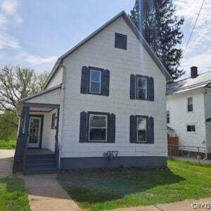 1011 Irving St, Olean-City, NY 14760 - view of front facade featuring a front lawn