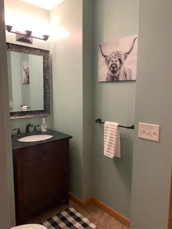 7136 Maples Rd, Mansfield, NY 14755 - bathroom featuring vanity, baseboards, a ceiling fan, and tile patterned flooring