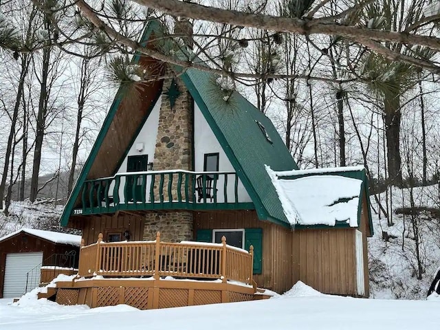 7136 Maples Rd, Mansfield, NY 14755 - view of front of home with an outdoor structure, a garage, and a balcony
