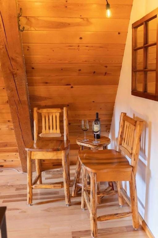 7136 Maples Rd, Mansfield, NY 14755 - interior space featuring vaulted ceiling, wooden walls, wood ceiling, and wood finished floors