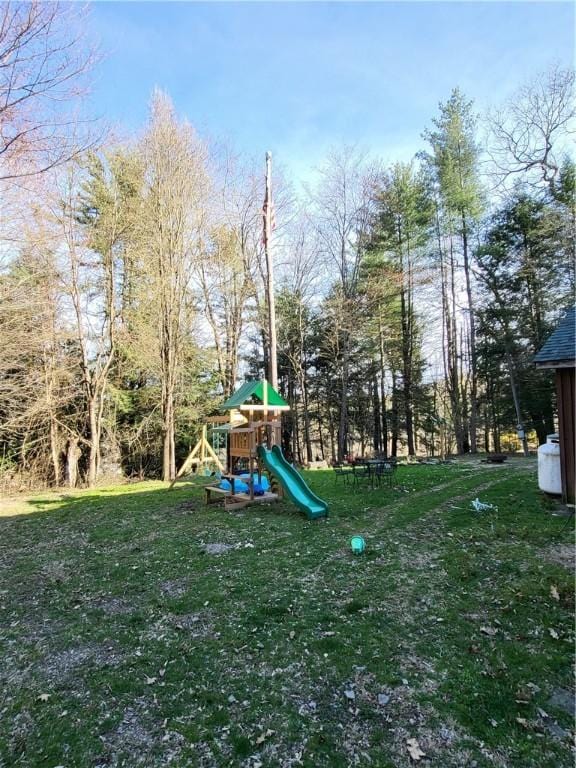 607 Kilkenny Rd, Unadilla, NY 13849 - view of play area with a yard