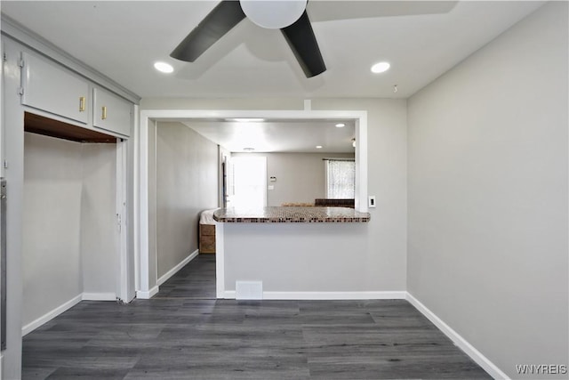 kitchen with dark wood-type flooring, baseboards, ceiling fan, and recessed lighting