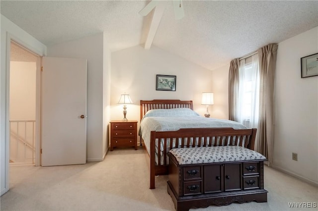 bedroom with light carpet, baseboards, a textured ceiling, and a ceiling fan