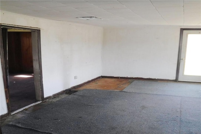9867 Transit Rd, Pavilion, NY 14054 - spare room featuring a paneled ceiling