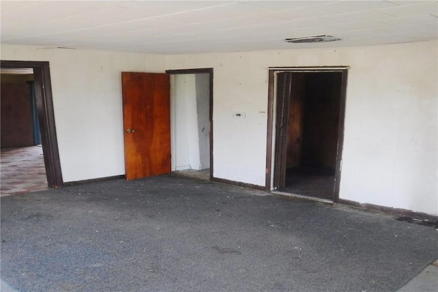 9867 Transit Rd, Pavilion, NY 14054 - spare room featuring carpet, visible vents, and baseboards