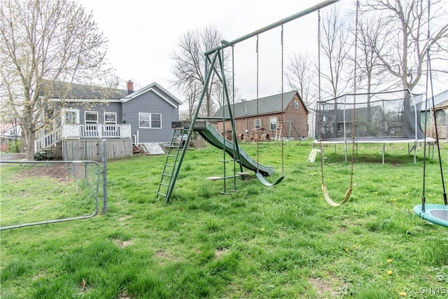 108 Mechanic St, Antwerp, NY 13608 - exterior space with a yard, a deck, and a trampoline