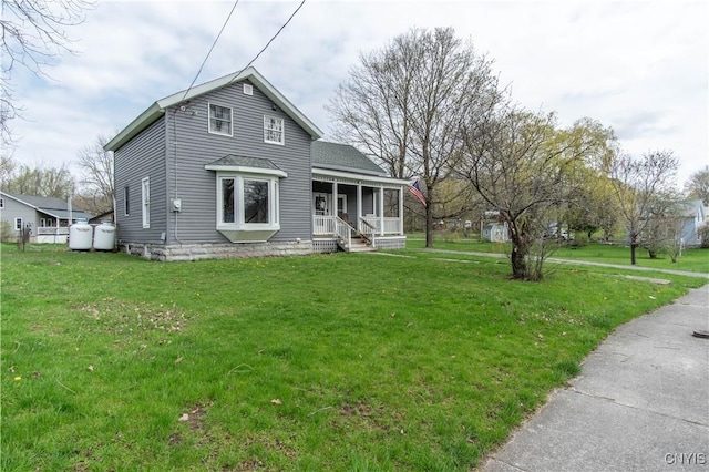 108 Mechanic St, Antwerp, NY 13608 - view of front of home featuring a front yard and covered porch