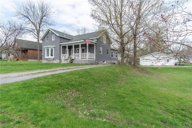 108 Mechanic St, Antwerp, NY 13608 - view of front of property featuring a front yard, a porch, and a shingled roof