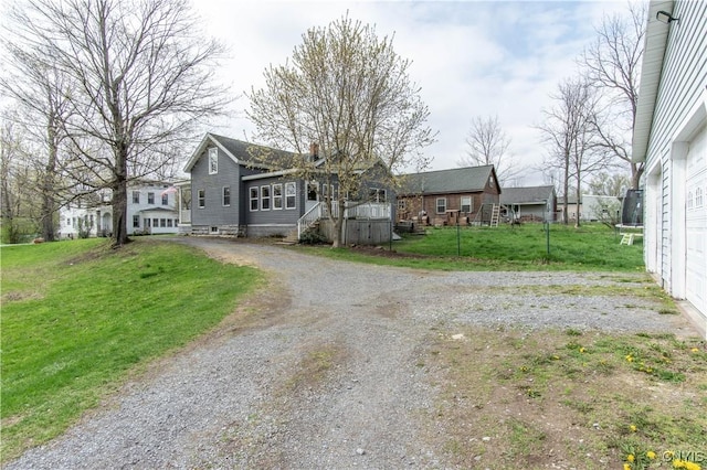 108 Mechanic St, Antwerp, NY 13608 - single story home with dirt driveway and a front yard