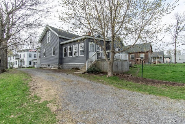 108 Mechanic St, Antwerp, NY 13608 - view of front of home with aphalt driveway and a front yard