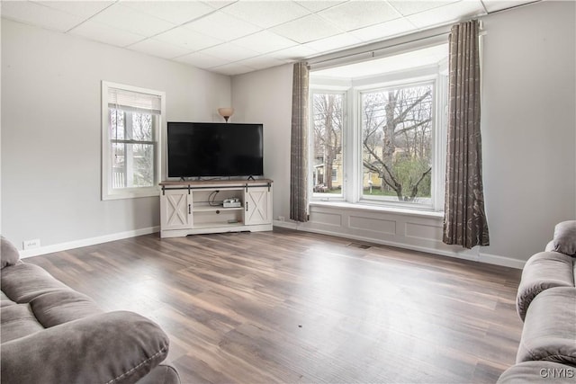 108 Mechanic St, Antwerp, NY 13608 - living room with plenty of natural light, visible vents, and wood finished floors