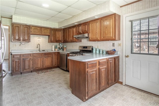 108 Mechanic St, Antwerp, NY 13608 - kitchen with a sink, light floors, dishwasher, under cabinet range hood, and light countertops