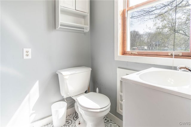 108 Mechanic St, Antwerp, NY 13608 - bathroom with toilet, baseboards, and vanity