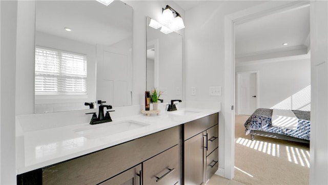 full bath featuring recessed lighting, double vanity, and a sink