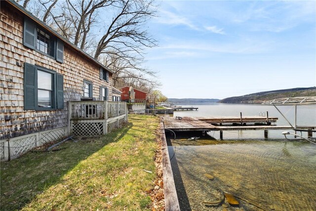 11519 E Lake Rd, Wayne, NY 14840 - view of yard featuring a water view and a dock