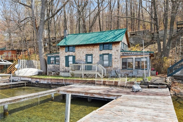 11519 E Lake Rd, Wayne, NY 14840 - back of house featuring metal roof, a wooden deck, and fence