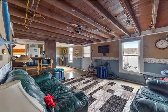 11519 E Lake Rd, Wayne, NY 14840 - living area with plenty of natural light, beam ceiling, and wooden ceiling