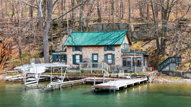 11519 E Lake Rd, Wayne, NY 14840 - exterior space with stairs, a deck with water view, and boat lift