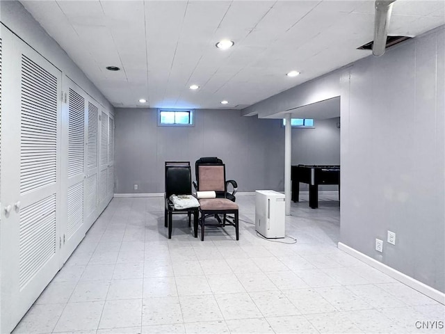 living area featuring recessed lighting
